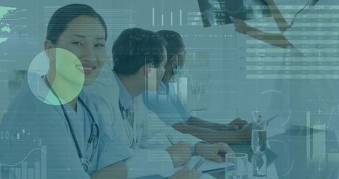 Medical Professionals Analyzing Data in Technology-Driven Conference