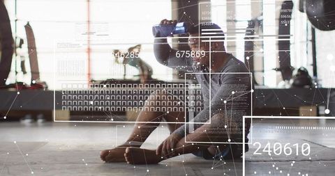 Sitting athlete holding vr headset after workout with hud analytics and fitness data