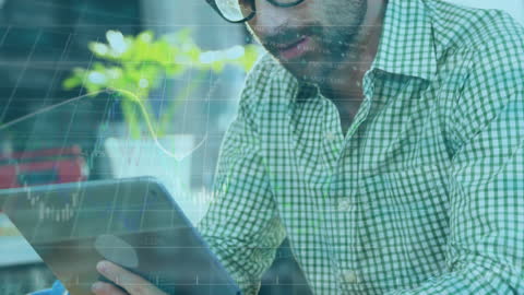 Businessman Analyzing Market Trends on Digital Tablet