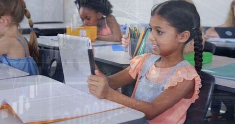 Multiracial Girl Using Tablet in Globalized Classroom Setting