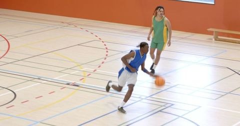 Energetic Basketball Game with Diverse Competitors in Action