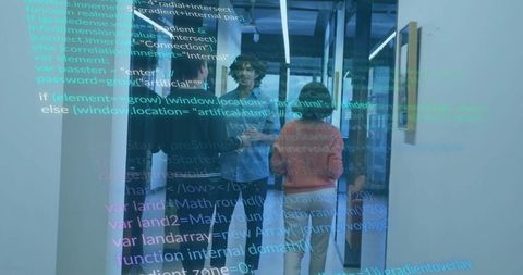 Developers Collaborating in Modern Office with Digital Display