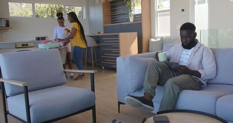 Modern family relaxing together at home