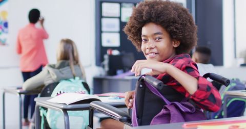 Inclusive Classroom with Smiling African American Schoolboy in Wheelchair - Download Free Stock Images Pikwizard.com