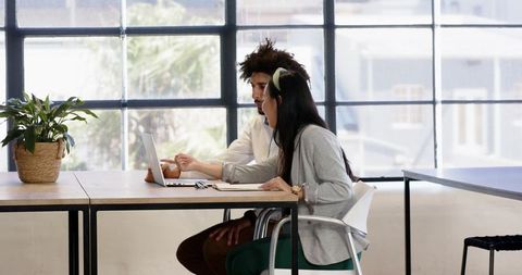 Business Collaboration in Modern Office Setting