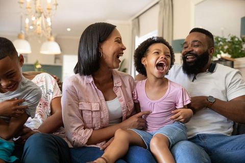 Loving Family Enjoying Quality Time Together in Cozy Living Room