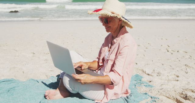 Senior Woman Working on Laptop at Beach - Download Free Stock Images Pikwizard.com