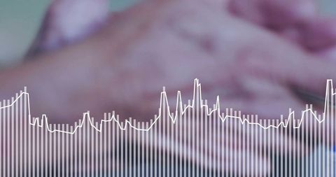 Clasping senior hands with digital waveform overlay conveying caregiving and health data