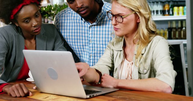 Diverse Team Working on Laptop in Office - Download Free Stock Images Pikwizard.com