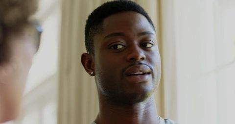 Handsome man smiling warmly at elegant event