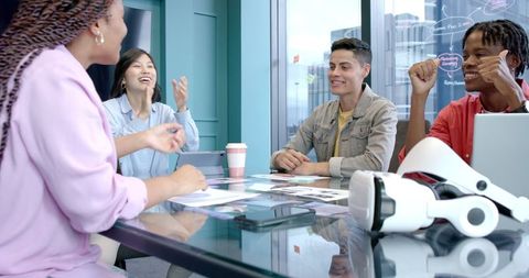 Diverse Team Brainstorming in Innovative Workspace with VR
