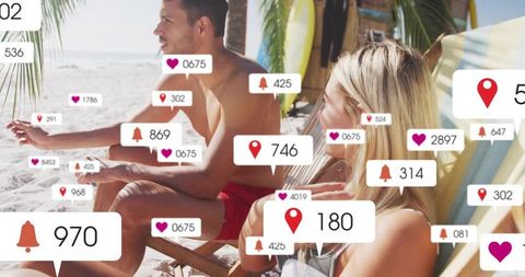 Couple relaxing on sunlit beach with floating social media notifications