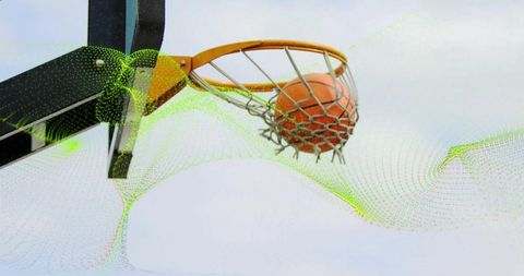 Basketball swishing through outdoor hoop dynamic action
