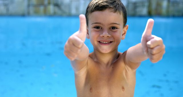 Happy Boy Giving Thumbs Up in Pool - Download Free Stock Images Pikwizard.com