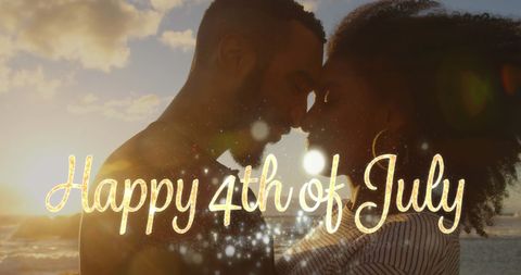 Couple Embracing at Sunset with 4th of July Greeting