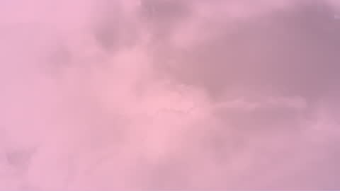 Dreamy Pink Clouds in Calm Sky Animation