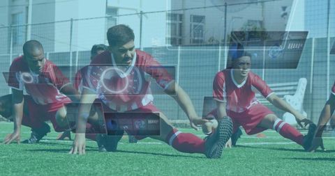 Digitally Augmented Soccer Team Engaging in Pre-Match Stretching