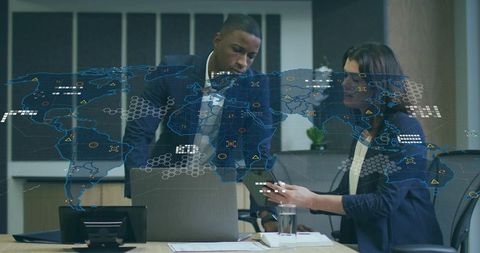 Business People Analyzing Digital World Map Overlay in Modern Office