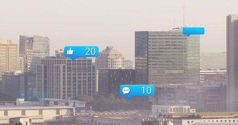 High-Rise Skyscrapers with Social Media Icons at Dawn