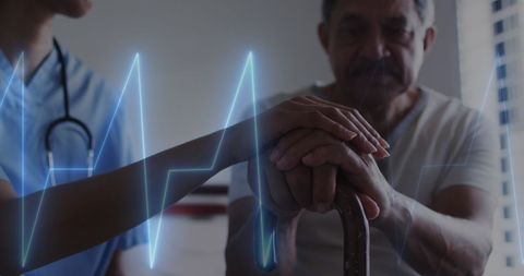 Compassionate Healthcare Worker Supports Elderly Patient in Medical Setting