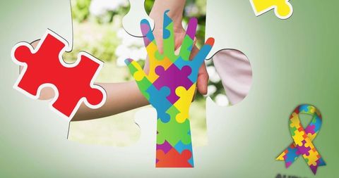Colorful Puzzle Piece Hand Symbolizing Autism Awareness Support - Download Free Stock Images Pikwizard.com