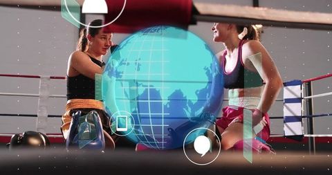 Two Female Boxers Resting and Chatting in Ring with Futuristic HUD Globe Overlay