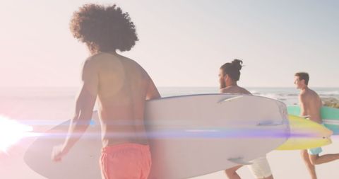 Diverse Friends Running to Ocean with Surfboards - Download Free Stock Images Pikwizard.com
