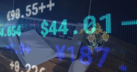 Financial Data Displayed Over Office Workspace Symbolizing Business