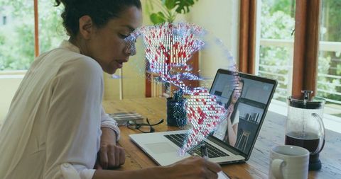 Woman working from home with laptop and coffee, remote meeting