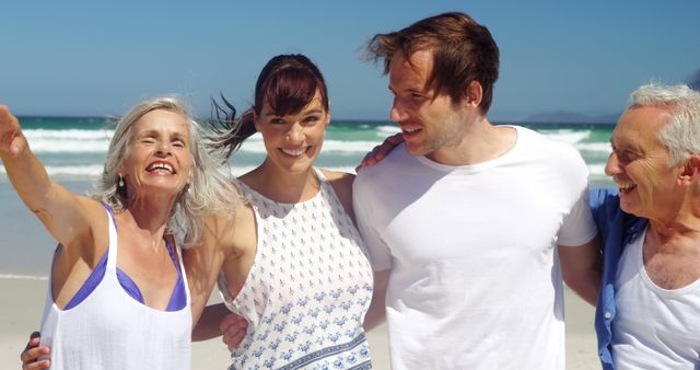 Family Enjoying Beach Day Together Laughing and Bonding - Download Free Stock Images Pikwizard.com