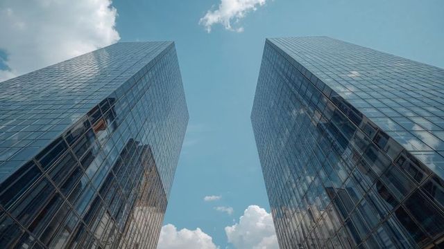 Majestic Mirrored Skyscrapers Reflecting Modern Urban Skyline