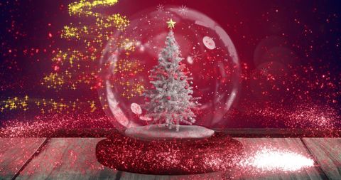 Snow Globe with Festive Tree against a Sparkling Red Background
