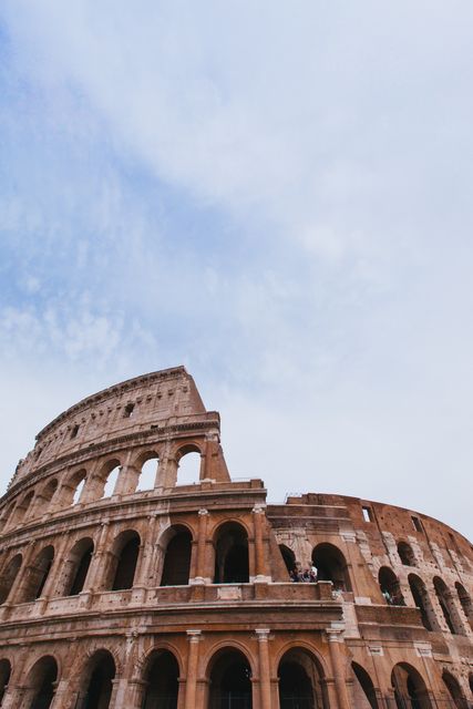 Roman Colosseum under Clear Blue Sky, Ancient Architecture - Download Free Stock Photos Pikwizard.com