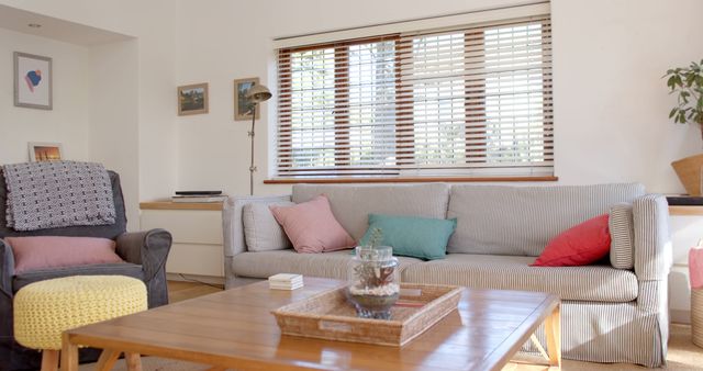 Bright and Cozy Living Room Interior with Modern Furniture and Decorative Pillows - Download Free Stock Images Pikwizard.com