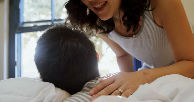 Happy Mother Talking with Child at Home - Download Free Stock Images Pikwizard.com