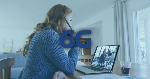 Businesswoman Engaging in Virtual Meeting with 6G Emerging Technology