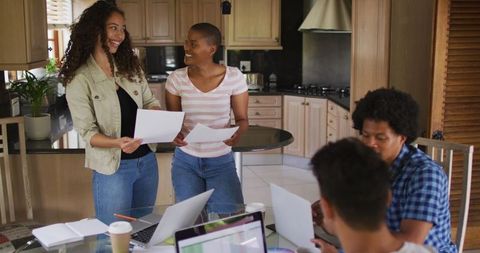 Diverse Group Collaborating in Home Kitchen