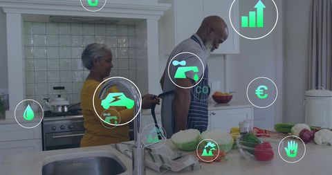 senior couple enjoying eco-friendly kitchen with sustainable technology - Download Free Stock Images Pikwizard.com
