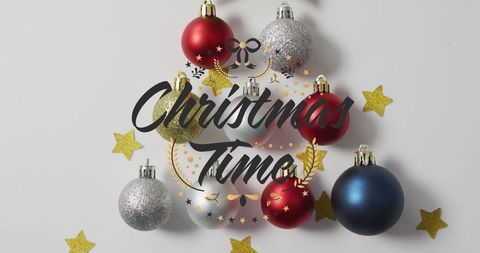 Festive Christmas Baubles with Star Confetti on White Background