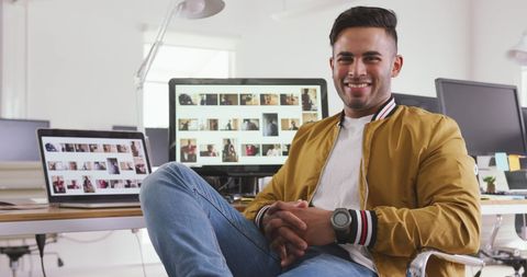 Confident Creative Professional Smiling in Modern Office