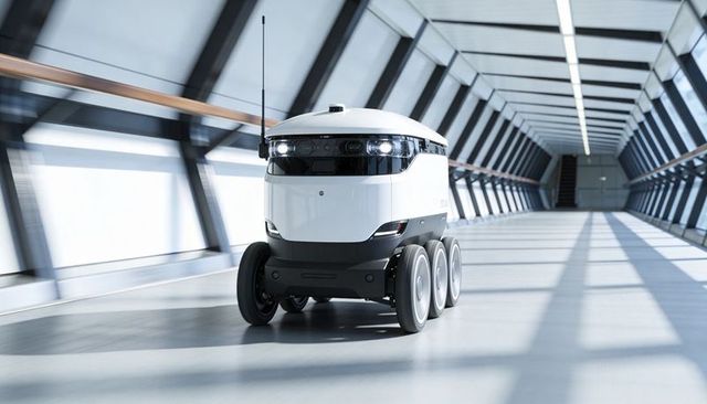 Gliding autonomous delivery robot navigating glass skybridge with sensor band