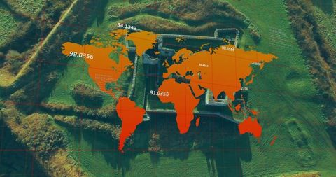 Orange world map overlay centering over medieval fortress ruin in countryside with numeric mapping l