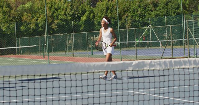 Female Tennis Player on Outdoor Court - Download Free Stock Images Pikwizard.com