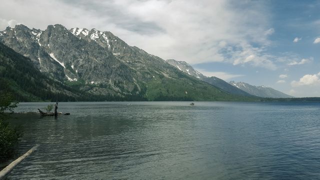 Scenic Mountain Landscape with Serene Lake and Cloudy Sky - Download Free Stock Photos Pikwizard.com