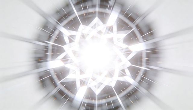 Emitting starburst ceiling light casting zoom-burst through geometric crystal diffuser