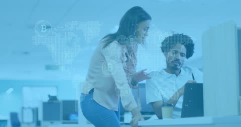 Business Colleagues Discussing Bitcoin in Modern Office Setting