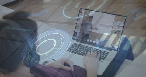Teen Learning Remotely on Laptop Wearing Headphones with Holographic Interface Overlay