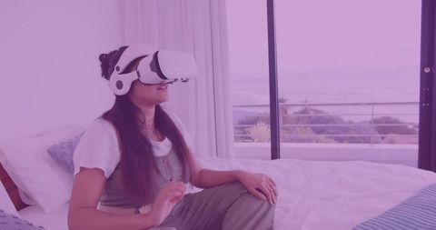 Relaxed Woman Experiencing Virtual Reality at Home