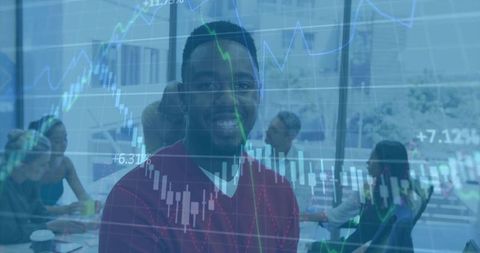 Business leader analyzing financial charts in modern office