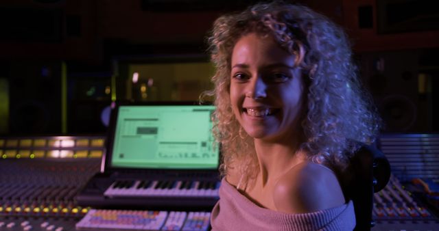 Smiling Young Woman in Music Studio - Download Free Stock Images Pikwizard.com